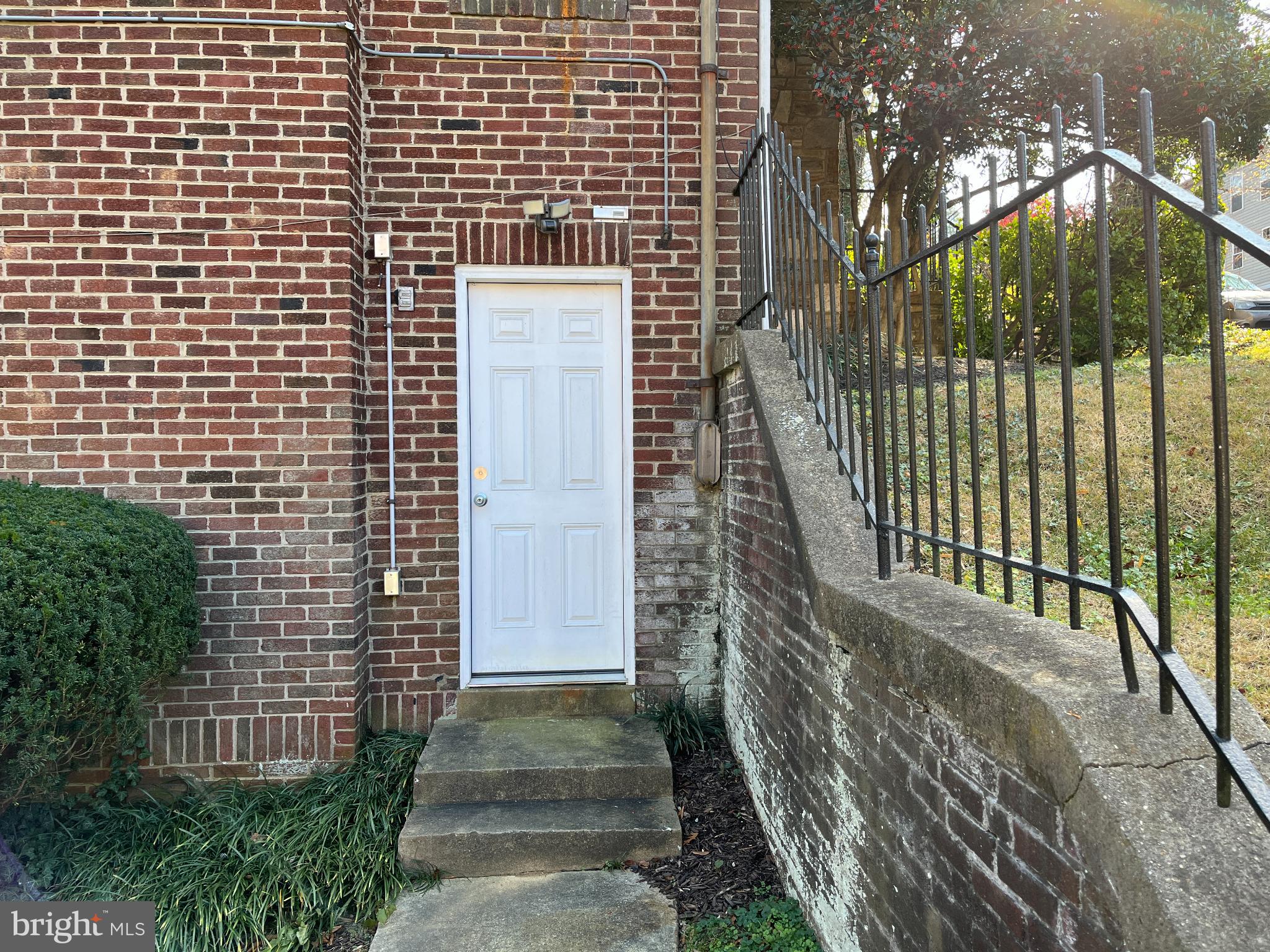 8009 Garland Avenue, Unit 1 Takoma Park, MD 20912 - Photo 14 of 22 Laundry room entrance at side of the property
