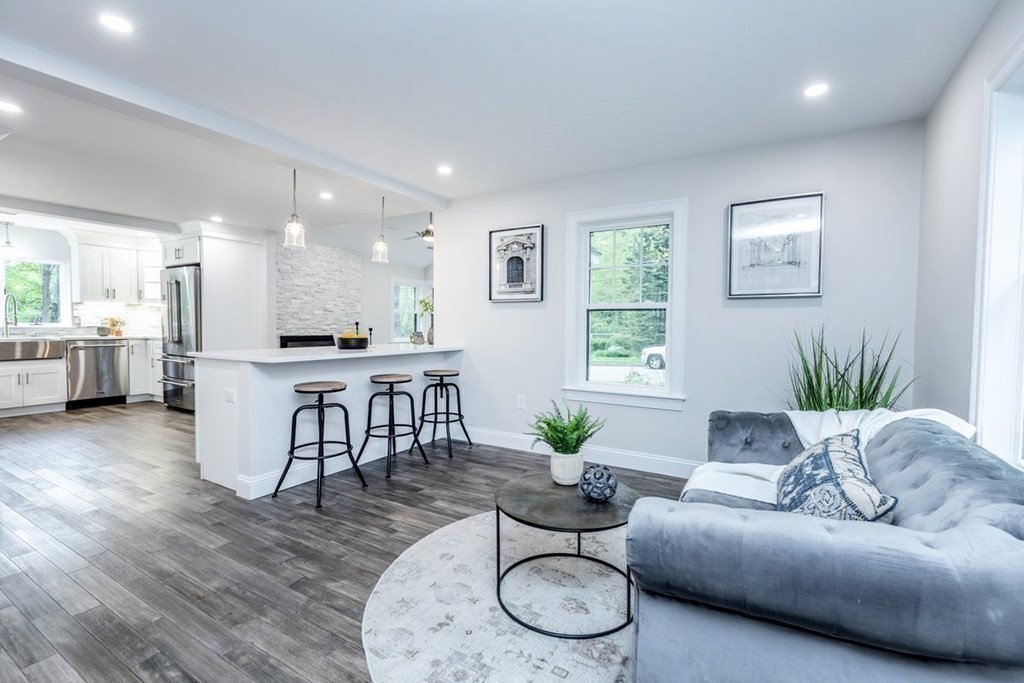 7 Elm Street North Reading, MA 01864 - Photo 12 of 42 a living room with furniture and a wooden floor