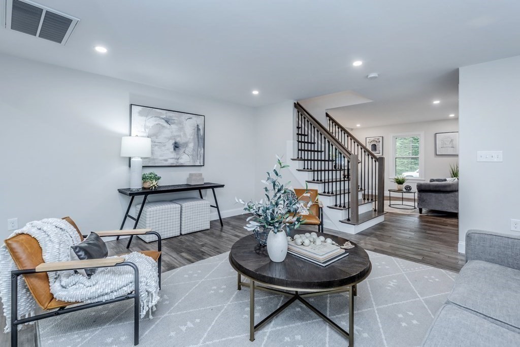 7 Elm Street North Reading, MA 01864 - Photo 13 of 42 a living room with furniture and wooden floor
