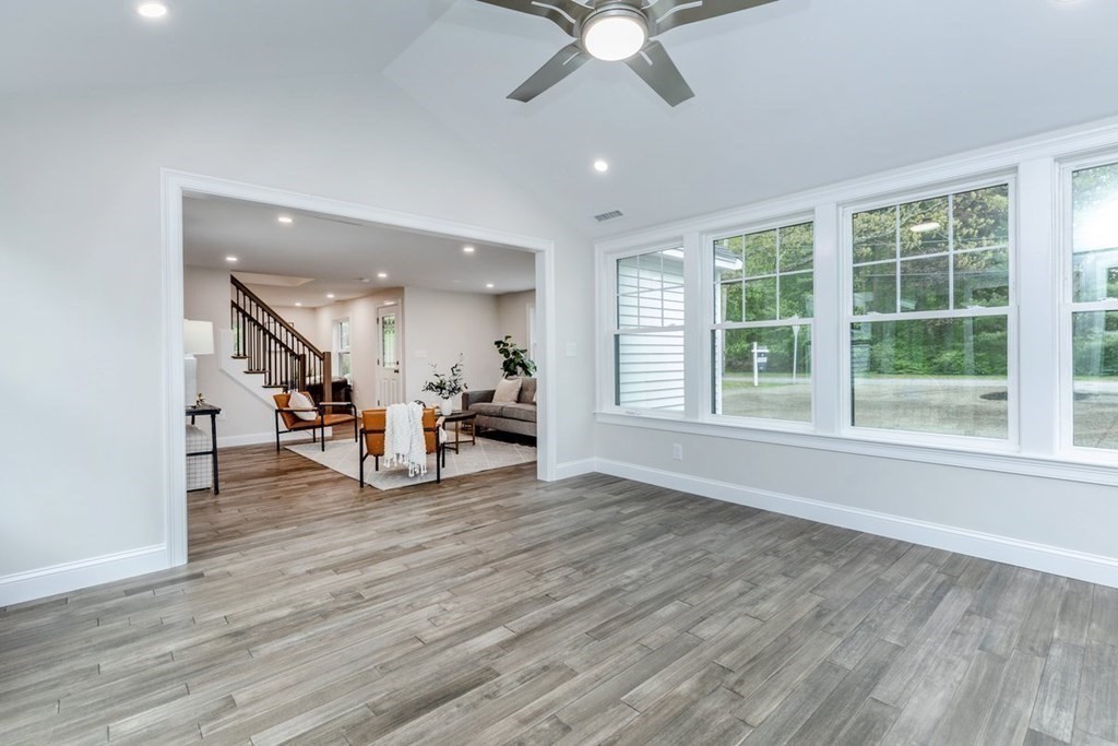 7 Elm Street North Reading, MA 01864 - Photo 16 of 42 a view of a livingroom with furniture and a flat screen tv