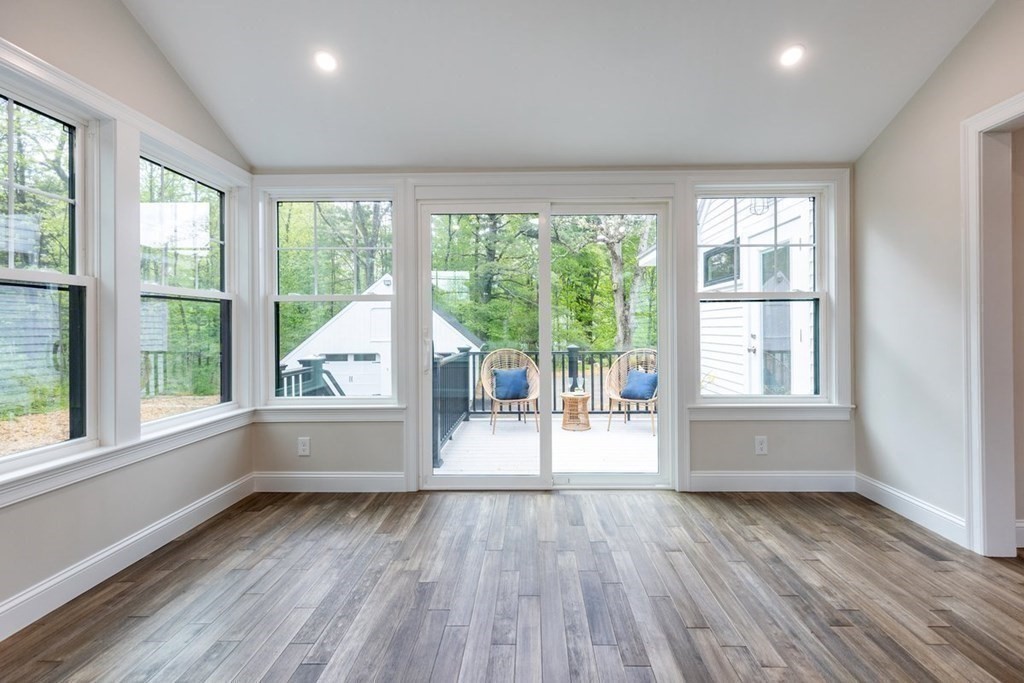 7 Elm Street North Reading, MA 01864 - Photo 18 of 42 a view of wooden floor and windows in a room