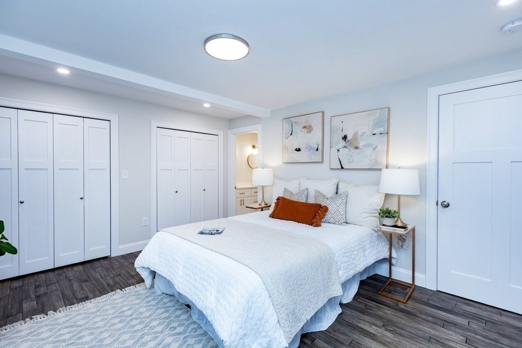 7 Elm Street North Reading, MA 01864 - Photo 22 of 42 a bedroom with a bed and wooden floor