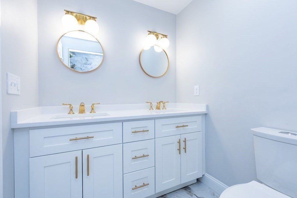 7 Elm Street North Reading, MA 01864 - Photo 25 of 42 a bathroom with 2 sink and a mirror