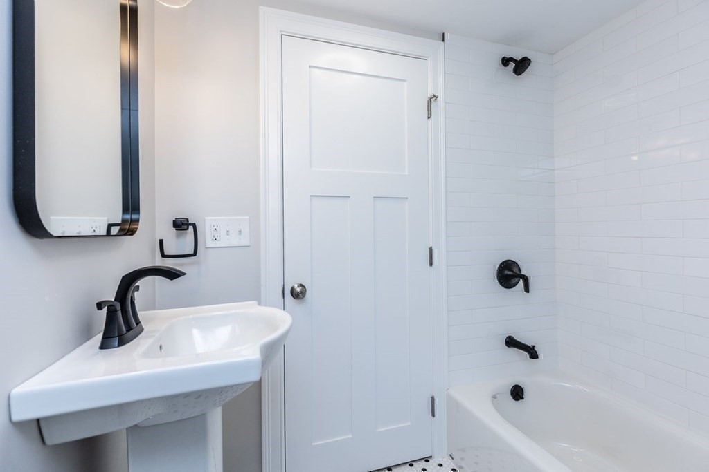 7 Elm Street North Reading, MA 01864 - Photo 29 of 42 a bathroom with a sink and a bathtub