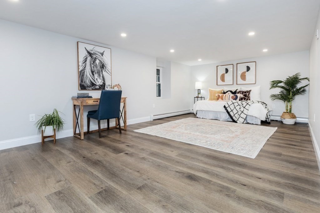 7 Elm Street North Reading, MA 01864 - Photo 32 of 42 a bedroom with furniture and a table