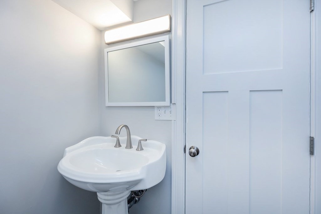 7 Elm Street North Reading, MA 01864 - Photo 34 of 42 a bathroom with a sink and mirror