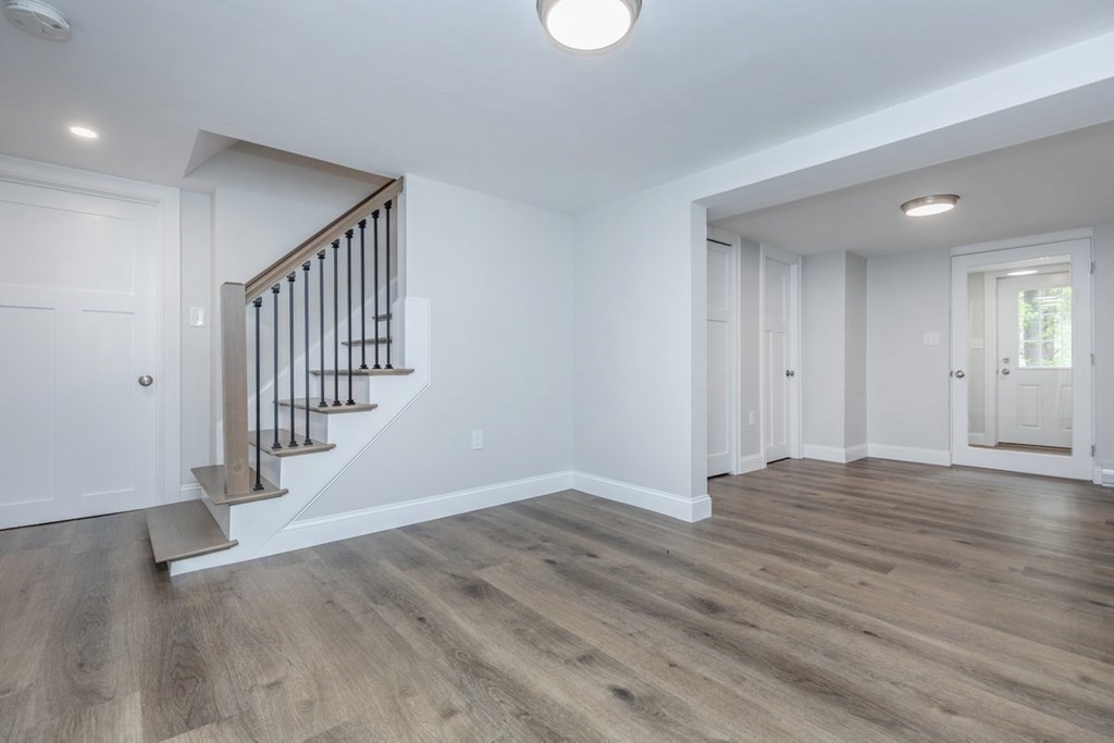 7 Elm Street North Reading, MA 01864 - Photo 35 of 42 wooden floor in an empty room with a window