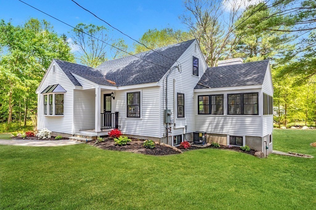 7 Elm Street North Reading, MA 01864 - Photo 38 of 42 a front view of house with yard and green space