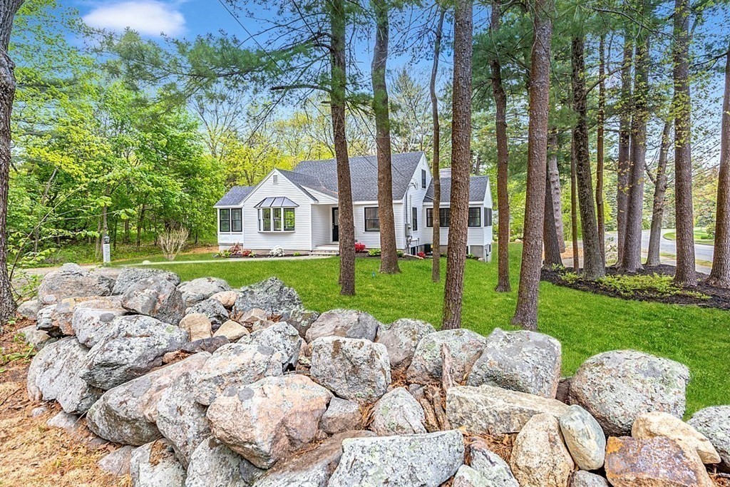 7 Elm Street North Reading, MA 01864 - Photo 4 of 42 a view of backyard with a garden and outdoor seating