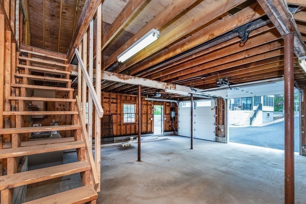 7 Elm Street North Reading, MA 01864 - Photo 41 of 42 a view of an empty room with wooden roof and windows