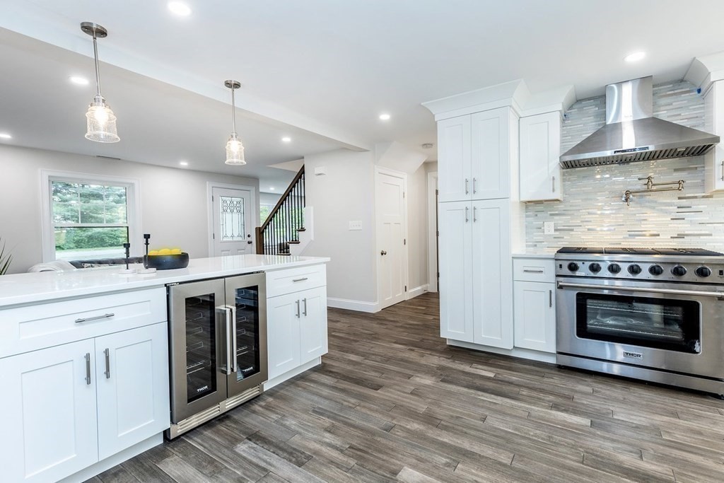 7 Elm Street North Reading, MA 01864 - Photo 8 of 42 a kitchen with a stove and a sink