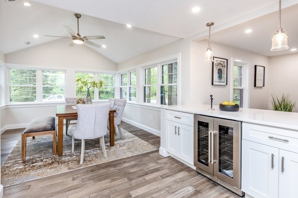 7 Elm Street North Reading, MA 01864 - Photo 9 of 42 a view of a dining room with furniture a chandelier and wooden floor
