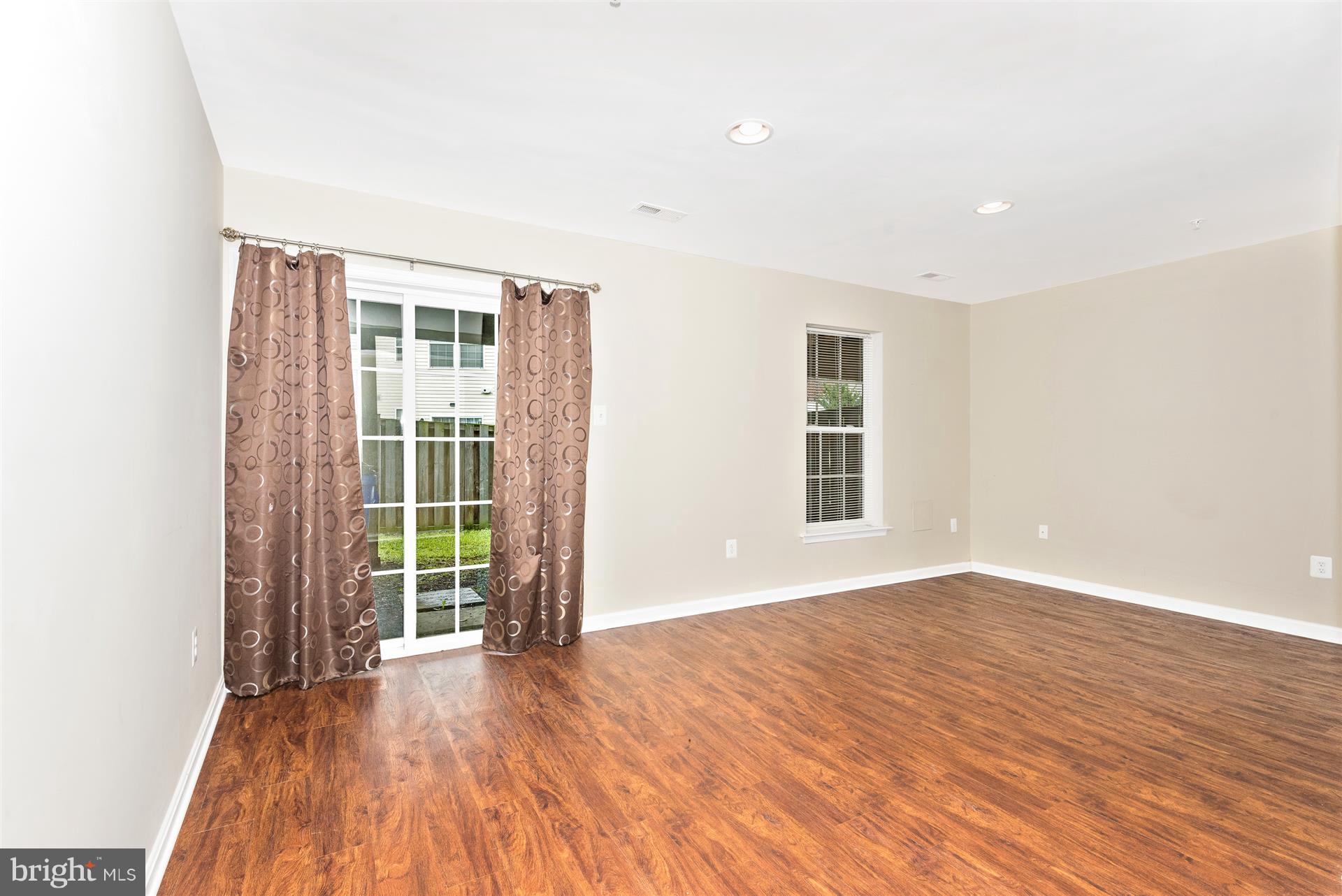664 Wild Hunt Road Frederick, MD 21703 - Photo 5 of 30 Family Room w/ Exit to Fenced Rear Yard