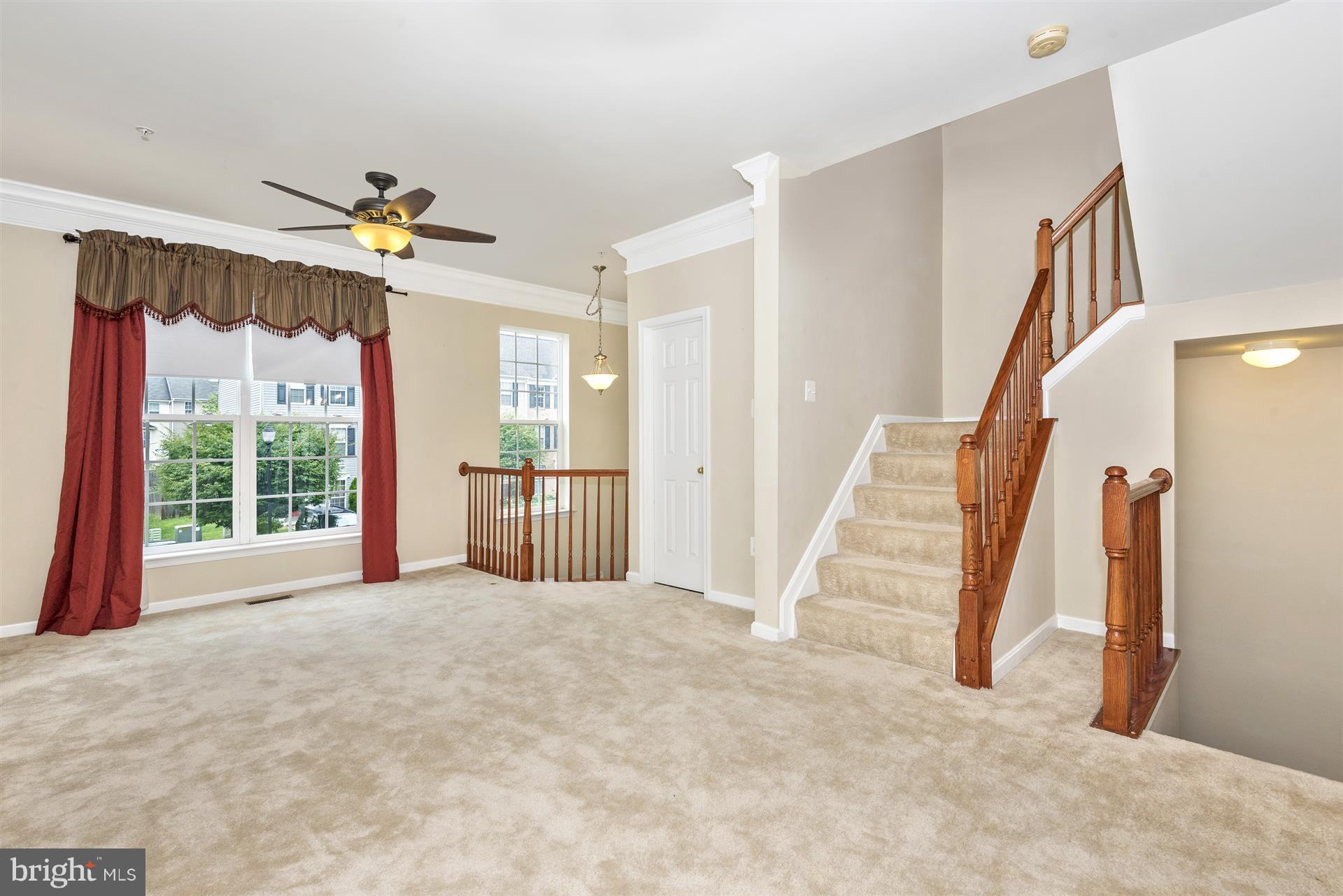 664 Wild Hunt Road Frederick, MD 21703 - Photo 10 of 30 Living Room w/ Overlook to Foyer