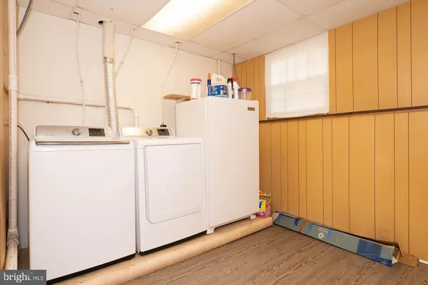a bathroom with a toilet and a sink