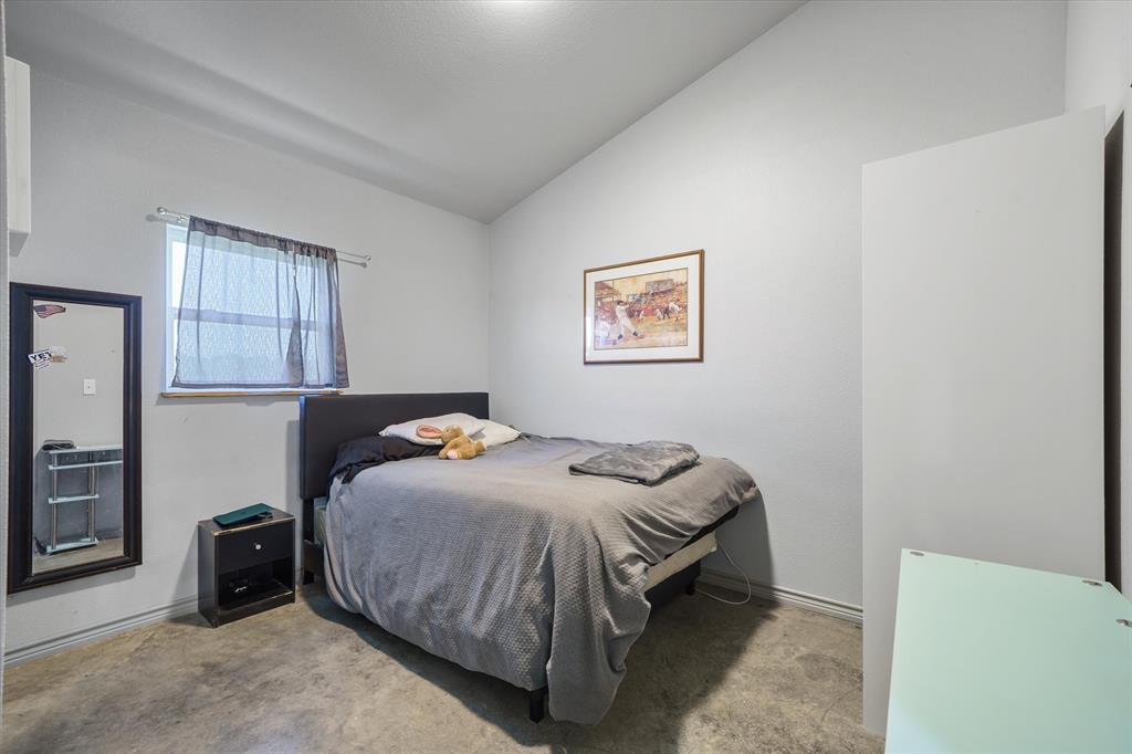 1026 VZ County Road Canton, TX 75103 - Photo 22 of 40 a bedroom with a bed and wall painting