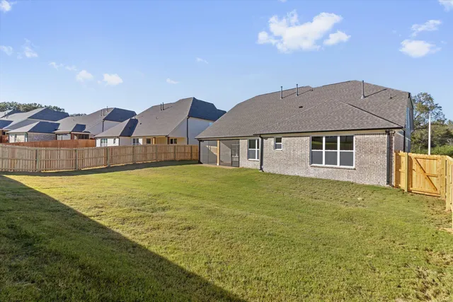 a view of a house with a swimming pool