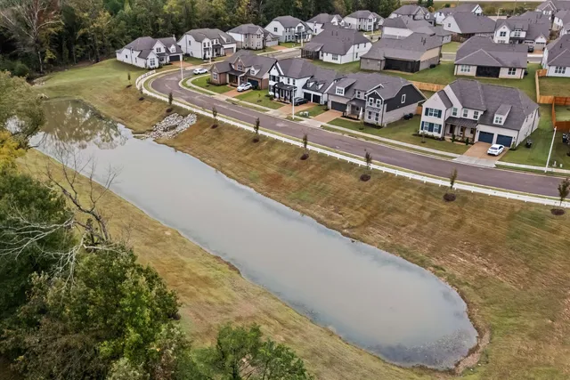 a view of swimming pool with outdoor seating