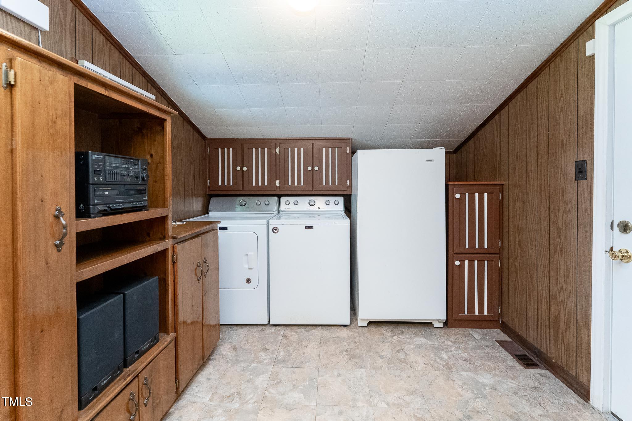 2809 Providence Road Raleigh, NC 27610 - Photo 16 of 39 a utility room with dryer and washer