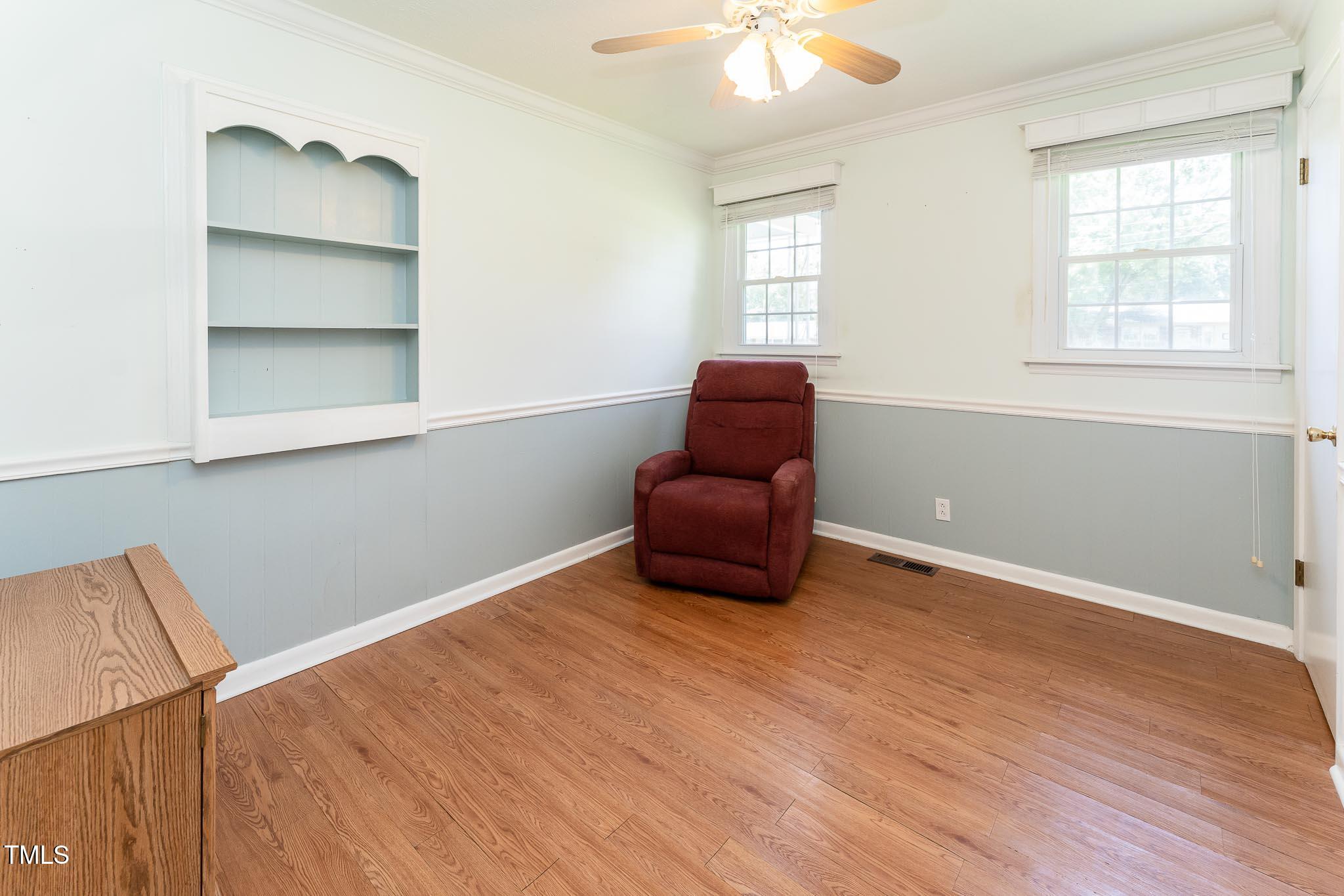 2809 Providence Road Raleigh, NC 27610 - Photo 23 of 39 an empty room with wooden floor and windows