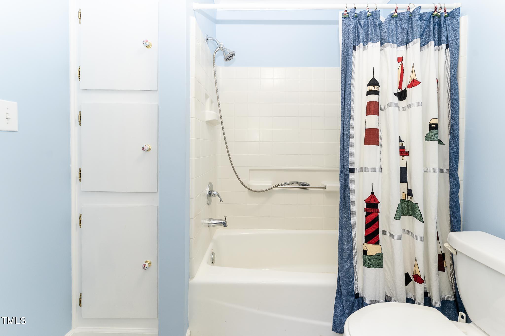 2809 Providence Road Raleigh, NC 27610 - Photo 33 of 39 a bathroom with a shower a toilet and a shower