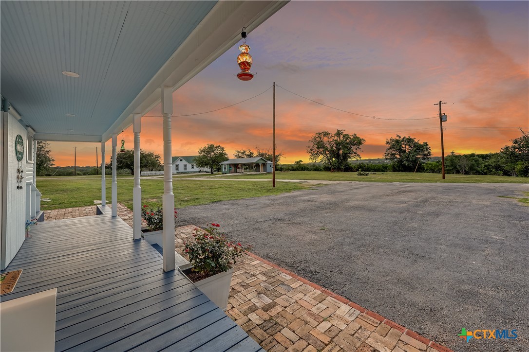 13471 Cedar Valley Road Salado, TX 76571 - Photo 5 of 41 a view of a big room with wooden floor and fence