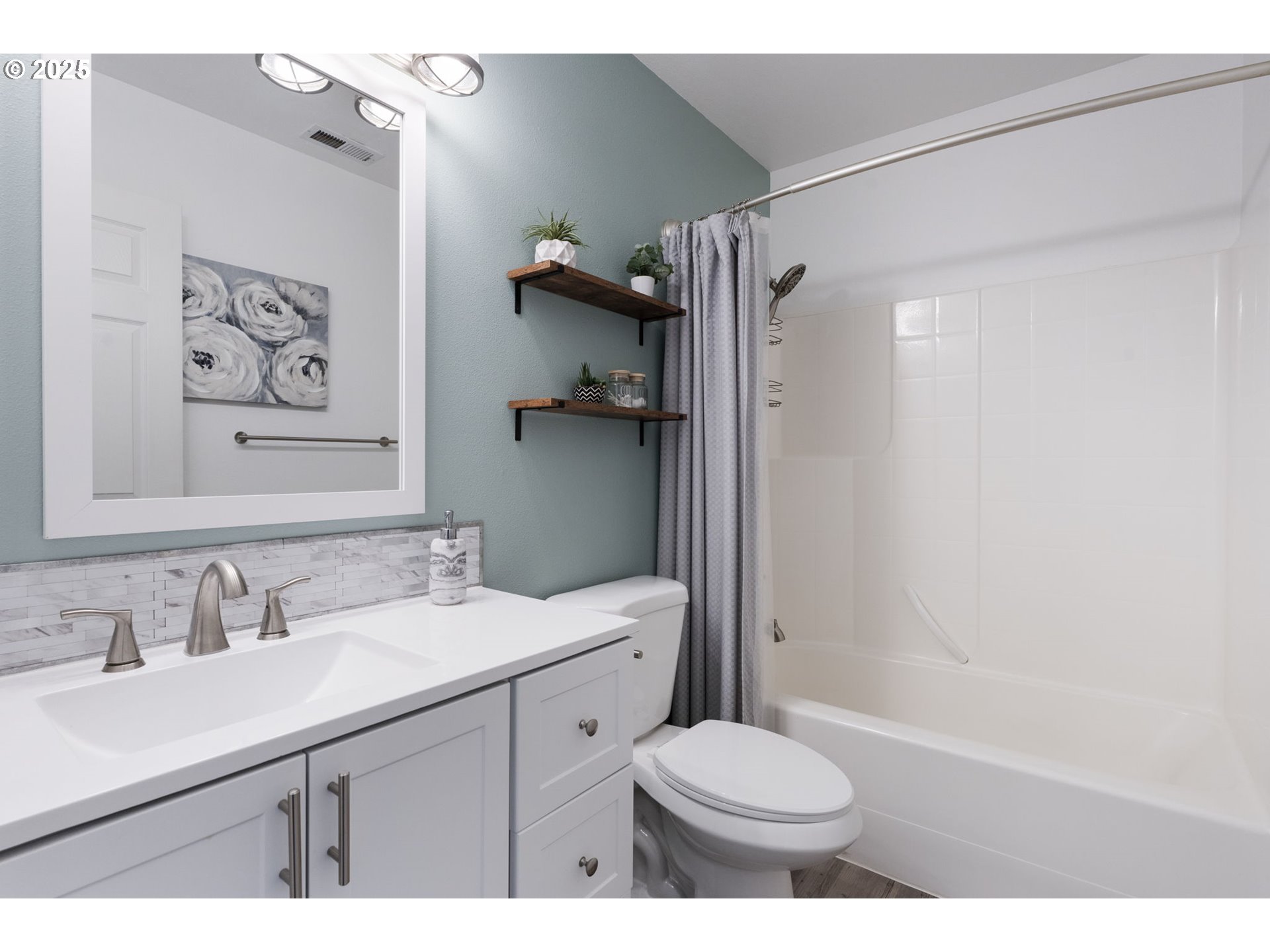887 Southwest 198th Place Beaverton, OR 97003 - Photo 16 of 33 a bathroom with a sink toilet and shower