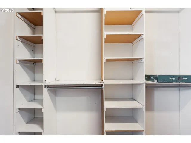 a view of an empty walk in closet