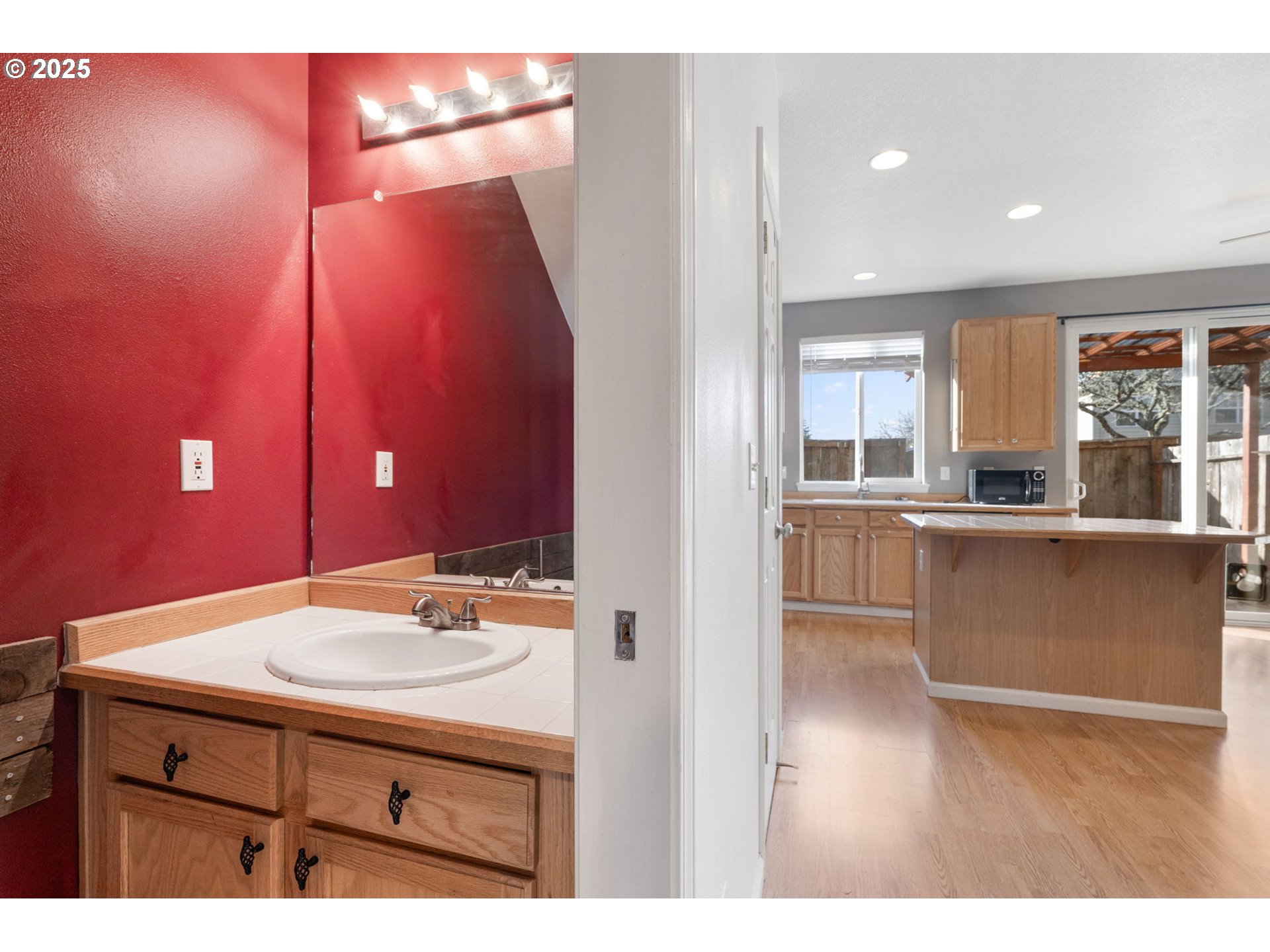 887 Southwest 198th Place Beaverton, OR 97003 - Photo 5 of 33 a bathroom with a sink and a mirror