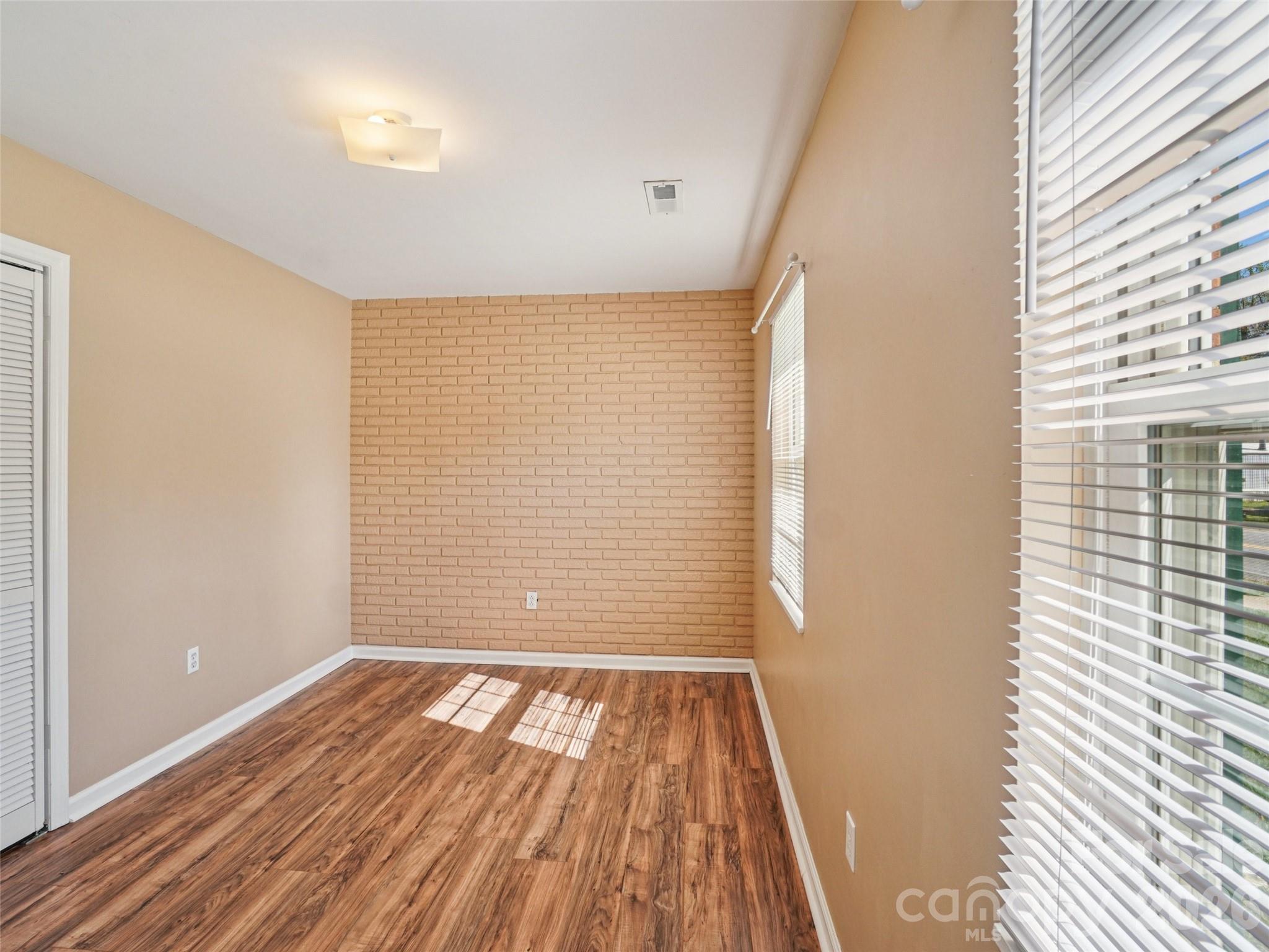 88 Lees Creek Road Asheville, NC 28806 - Photo 13 of 29 a view of wooden floor in a room