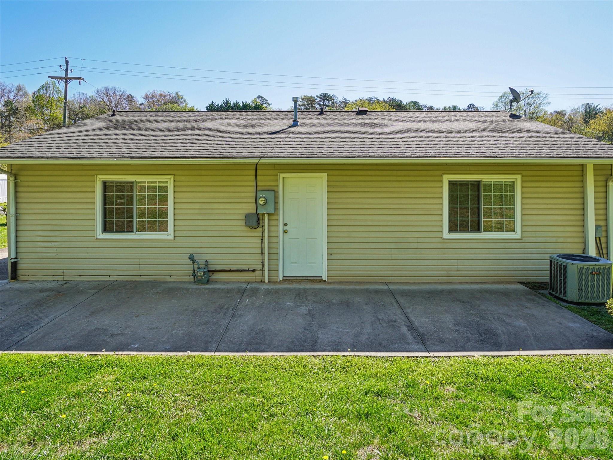 88 Lees Creek Road Asheville, NC 28806 - Photo 26 of 29 a view of a house with a backyard