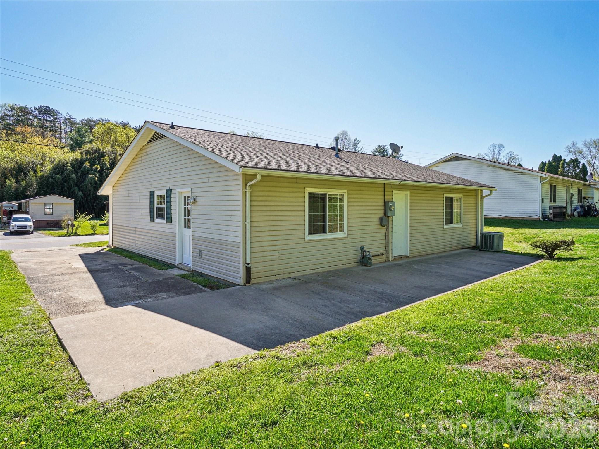88 Lees Creek Road Asheville, NC 28806 - Photo 27 of 29 a view of a house with a patio