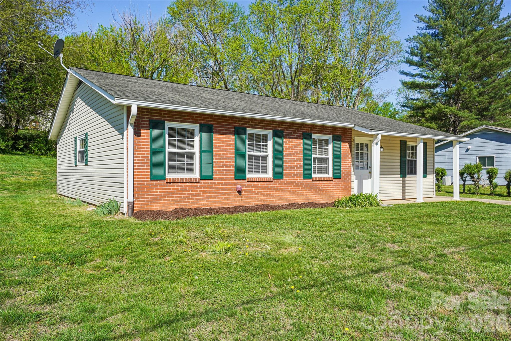 88 Lees Creek Road Asheville, NC 28806 - Photo 3 of 29 a view of a house with backyard
