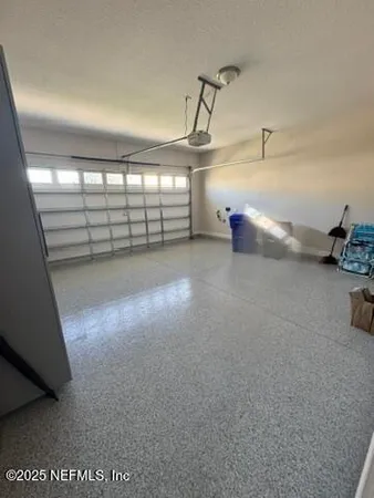 a view of a garage with windows