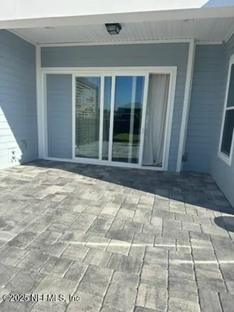 a view of entrance gate of a house