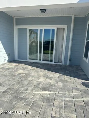 a view of entrance gate of a house