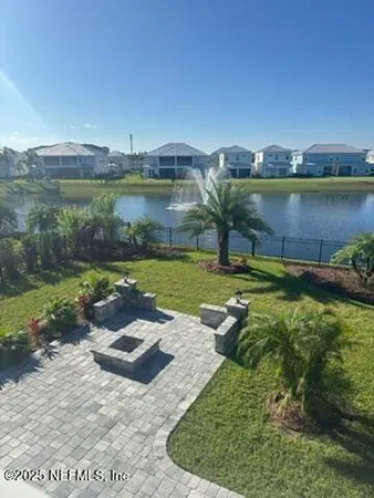 a view of a lake with a building in the background