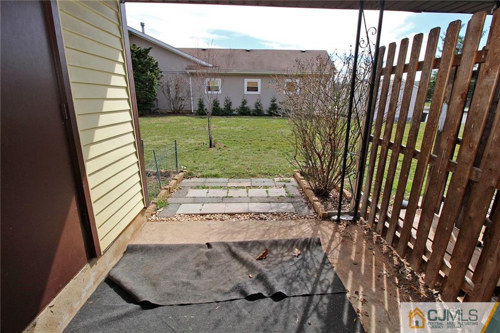 5203 Hana Road Edison, NJ 08817 - Photo 23 of 25 a view of a back yard of the house