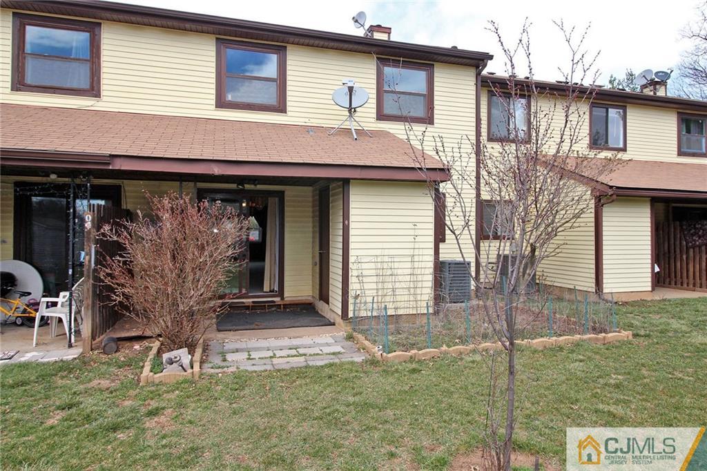 5203 Hana Road Edison, NJ 08817 - Photo 24 of 25 a view of a house with backyard porch and sitting area