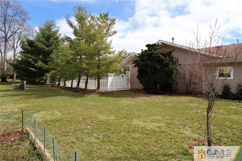 5203 Hana Road Edison, NJ 08817 - Photo 25 of 25 a view of a house with a yard