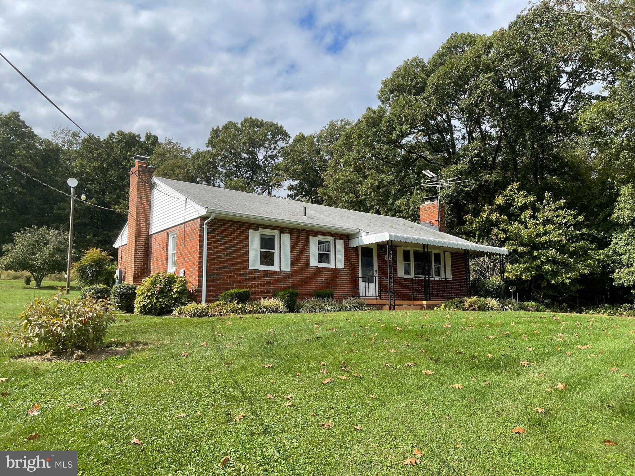 1670 Florence Road Mount Airy, MD 21771 - Photo 1 of 20 a front view of house with yard and green space