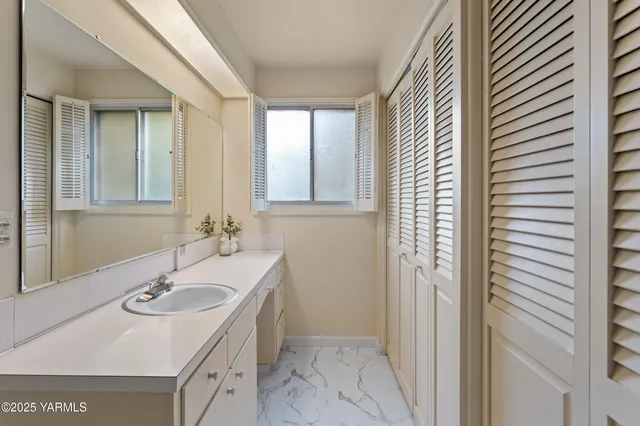 a room with a balcony and a toilet