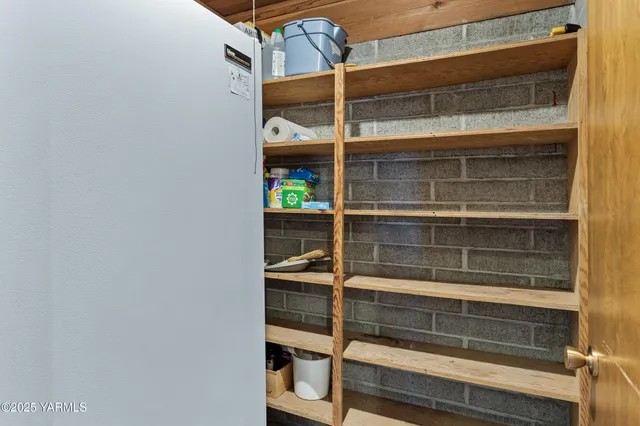 a backyard of a house with lots of green space and seating area