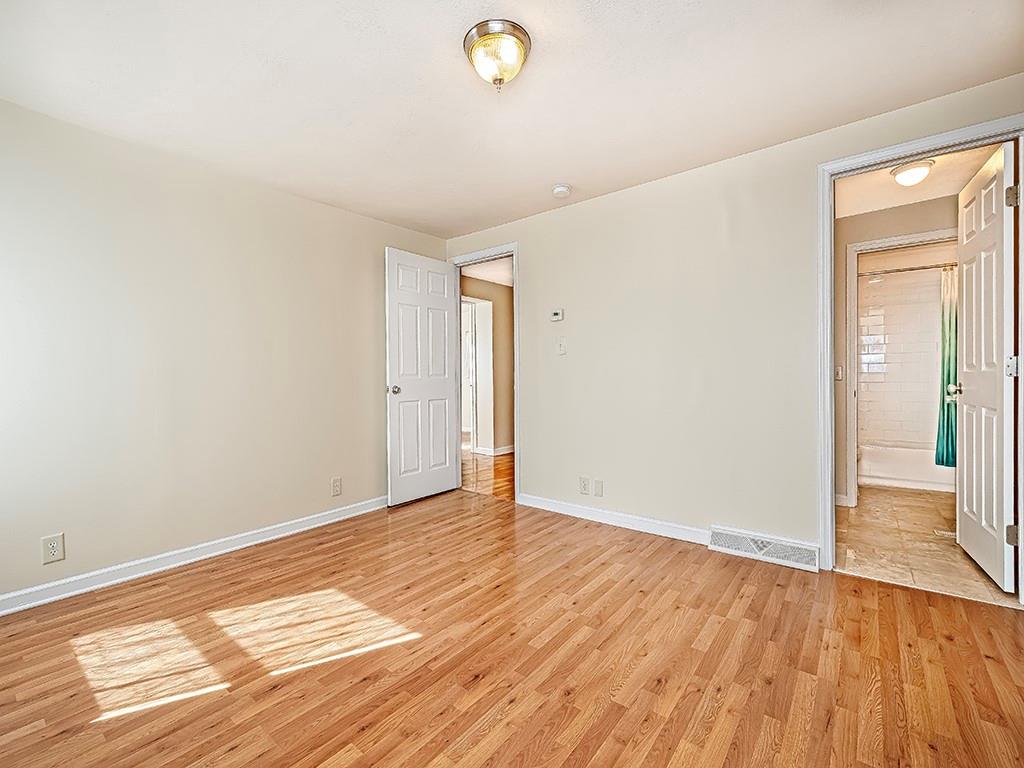 232 New Castle Street Slippery Rock, PA 16057 - Photo 16 of 23 a view of an empty room and wooden floor