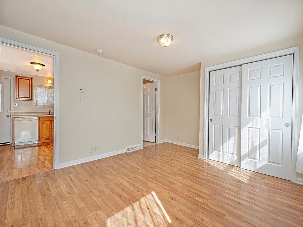 232 New Castle Street Slippery Rock, PA 16057 - Photo 17 of 23 a view of an empty room with wooden floor