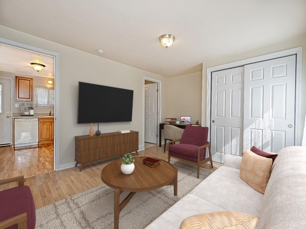 232 New Castle Street Slippery Rock, PA 16057 - Photo 18 of 23 a living room with furniture and a flat screen tv