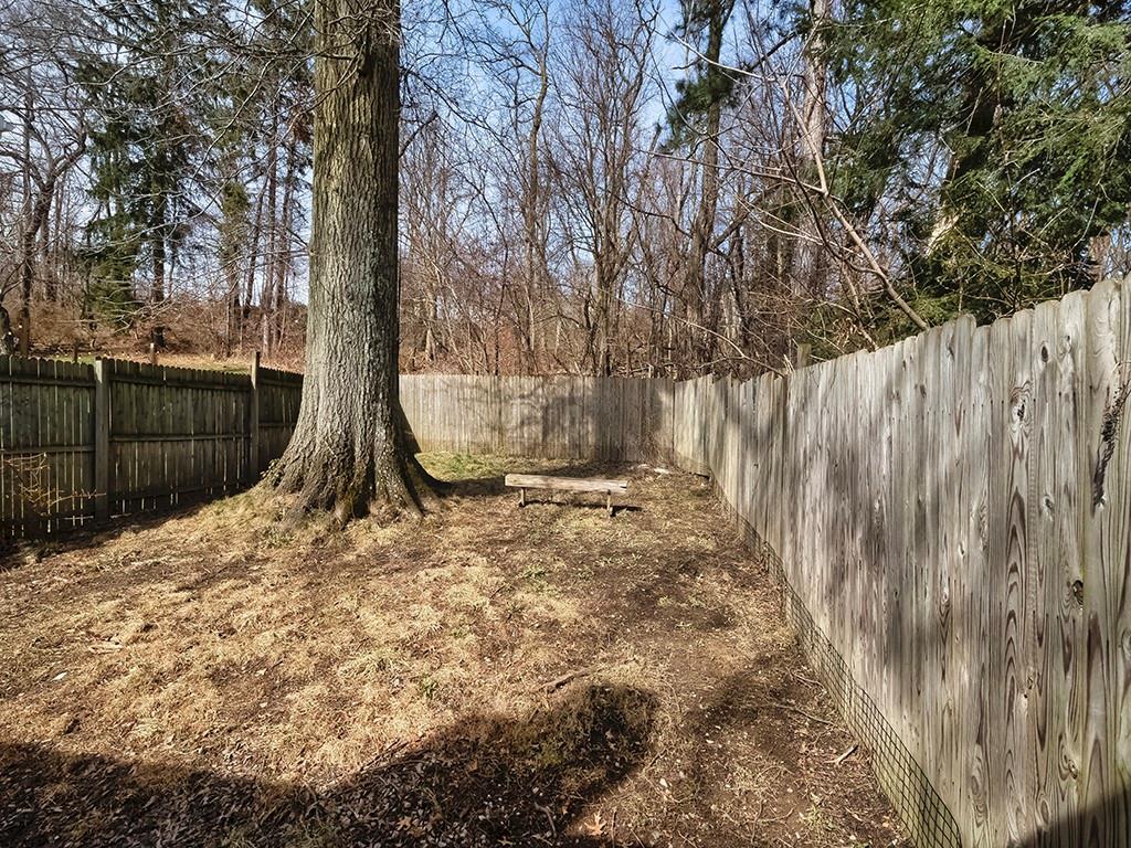 232 New Castle Street Slippery Rock, PA 16057 - Photo 22 of 23 a view of a backyard with large trees