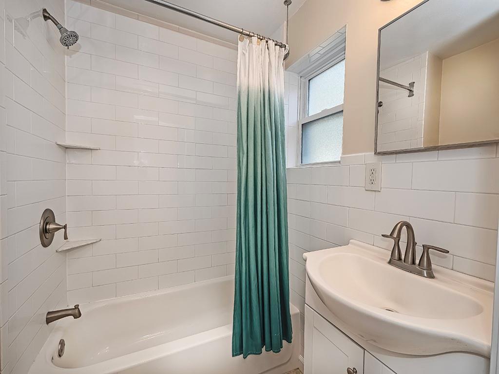 232 New Castle Street Slippery Rock, PA 16057 - Photo 8 of 23 a bathroom with a sink a toilet and shower