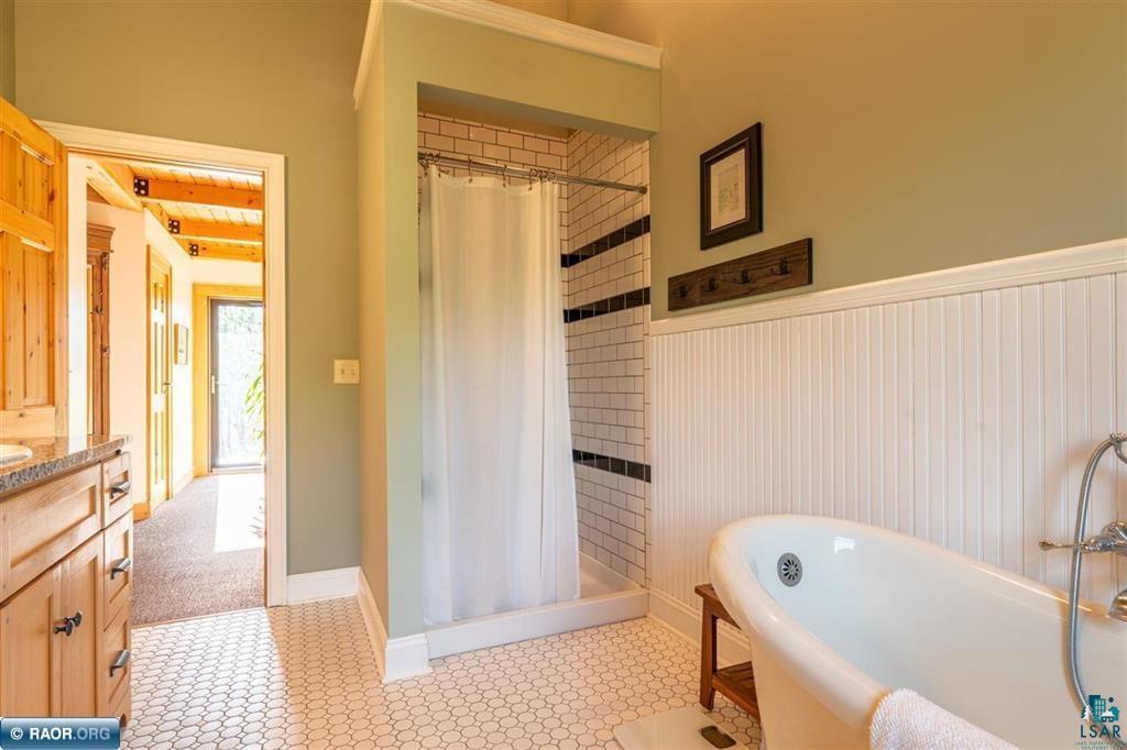 9648 Heino Road Angora, MN 55703 - Photo 15 of 49 Tub with Walk-in shower