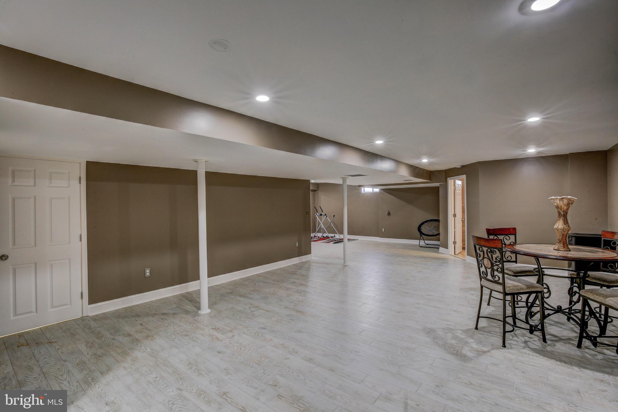 86 Jones Station Road Arnold, MD 21012 - Photo 38 of 42 Tiled basement -- perfect for entertaining!